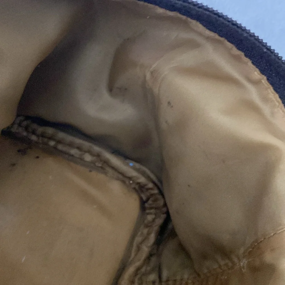 Dark brown royal-themed cosmetics bag